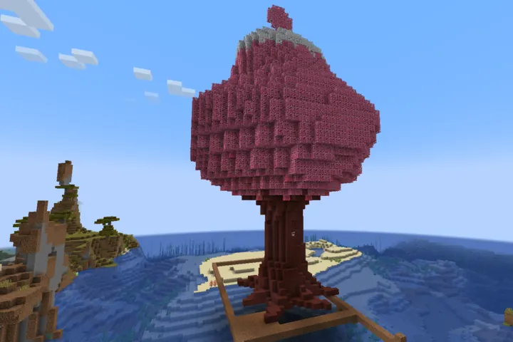 A giant hand-built pink tree anchors an island base.