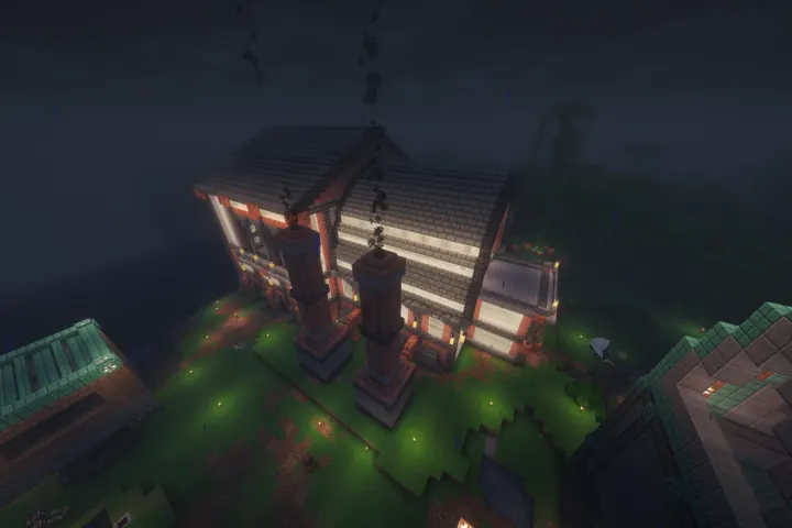 A Japanese-inspired estate emerges through the evening fog.