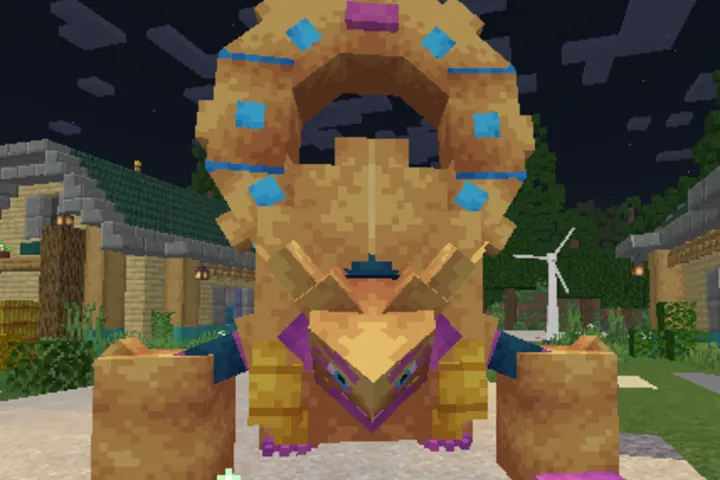 A playful Pokémon sculpture watches over the town.